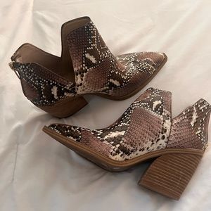 Vince Camuto animal print booties.Size 9.  Worn 1 timeSmoke and pet free home.